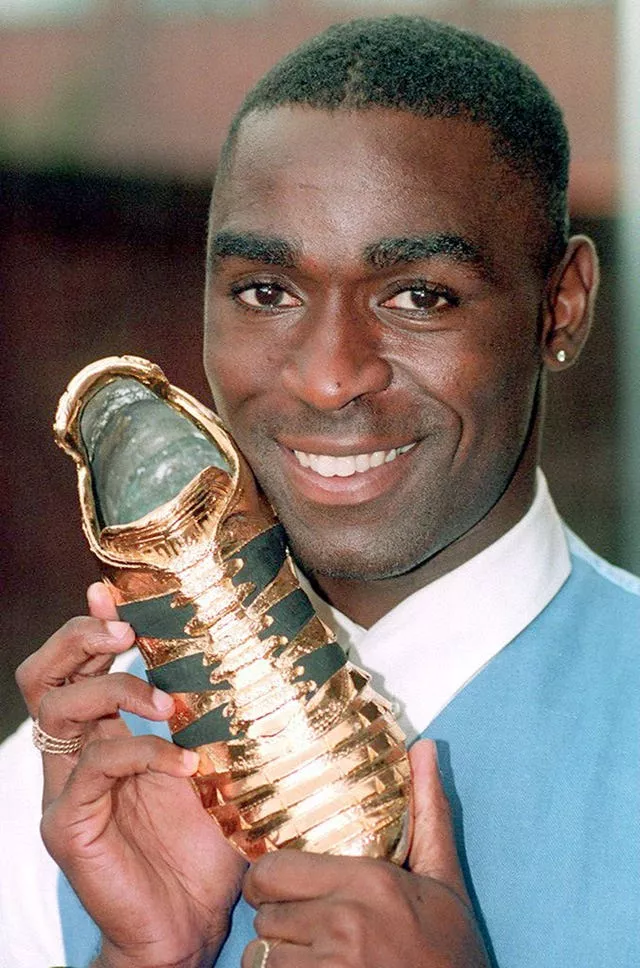 Andy Cole with the Premier League Golden Boot trophy