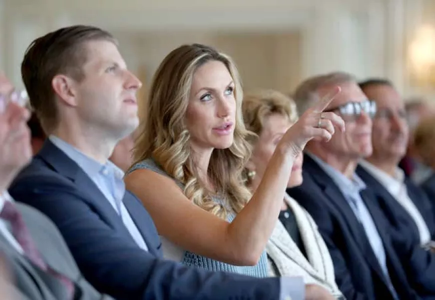 Lara Trump, centre, the wife of one of Donald Trump's sons Eric, left, has not ruled out running for office in North Carolina