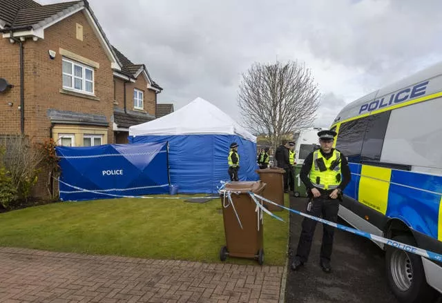 Police officers searching the home of Peter Murrell and Nicola Sturgeon