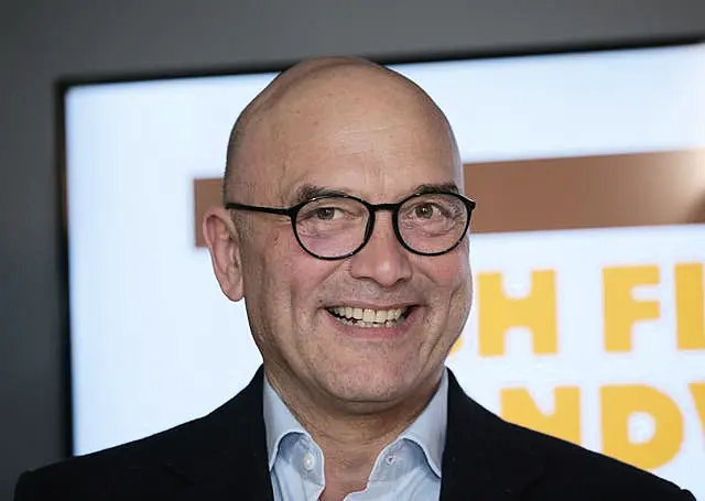 A close-up of Gregg Wallace smiling