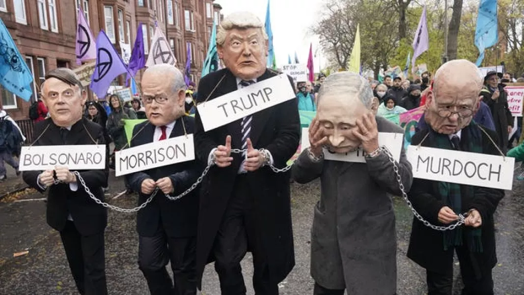 Protesters dressed as world figures (Danny Lawson/PA)