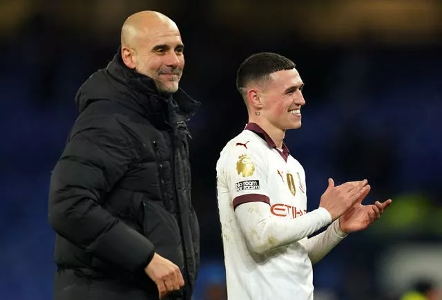 Pep Guardiola and Phil Foden