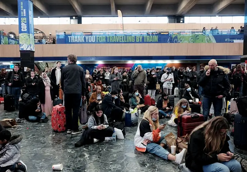 Passengers at Euston station in London (Yui Mok/PA)