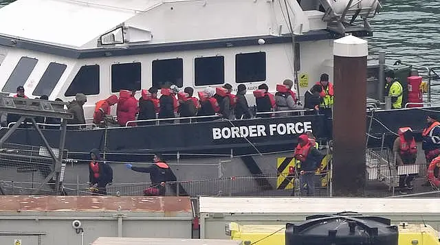 A group of people thought to be migrants are brought in to Dover, Kent, from a Border Force vessel