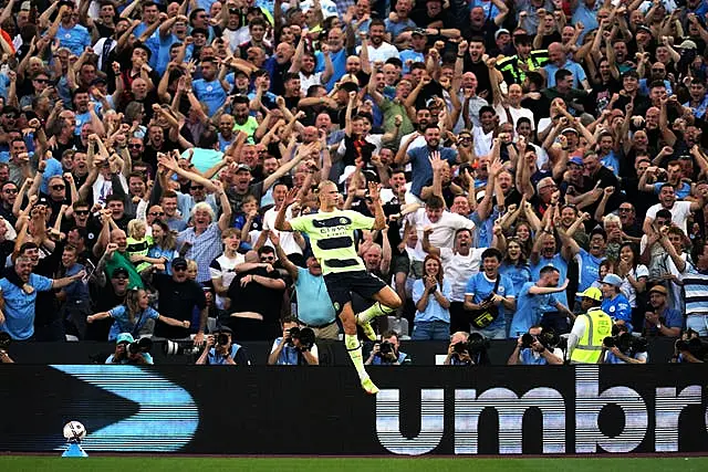 Erling Haaland celebrates in front of the City fans