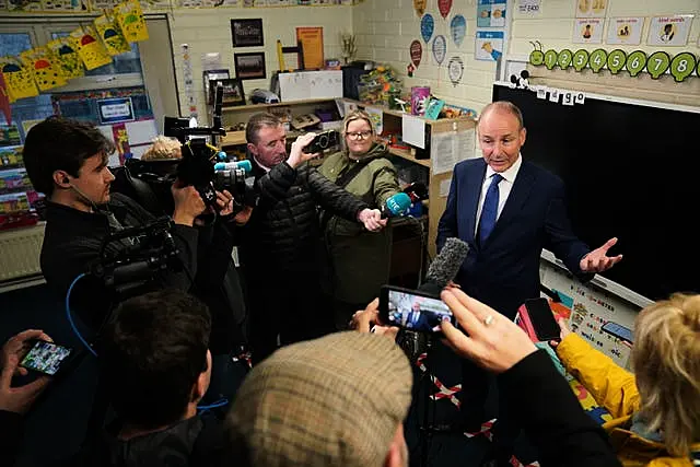 Mr Martin speaking to the media as he casts his vote