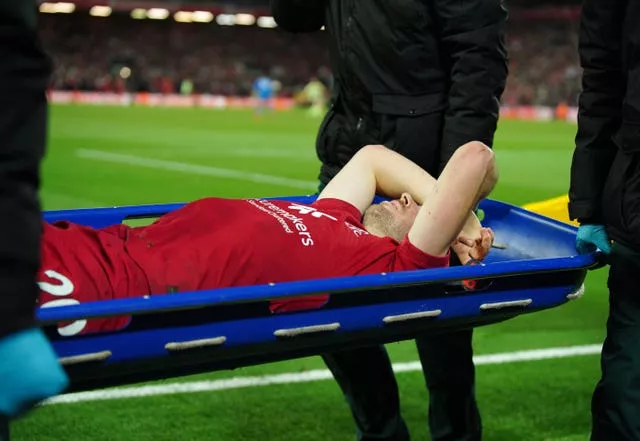 Diogo Jota is stretchered off against Manchester City