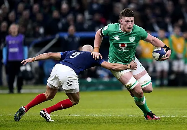 Ireland’s Joe McCarthy is tackled by France’s Maxime Lucu