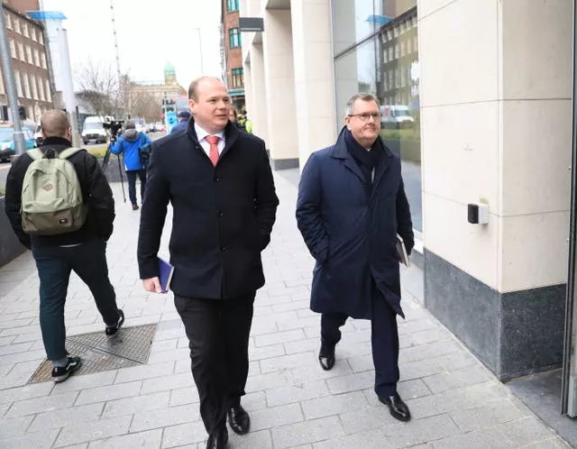 DUP leader Sir Jeffrey Donaldson, right, and party member Gordon Lyons MLA arrive at government buildings in Belfast city centre to discuss the impact of the Northern Ireland Protocol with Foreign Secretary James Cleverly, Northern Ireland Secretary Chris Heaton-Harris and other political party members on Wednesday