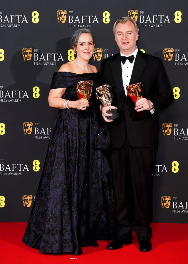 Christopher Nolan and Emma Thomas after winning the Best Film award for Oppenheimer