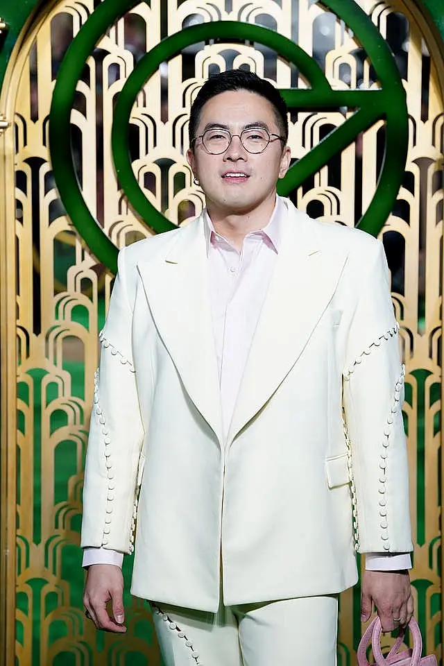 Bowen Yang arriving for the UK premiere of Wicked at the Royal Festival Hall, Southbank Centre in London.