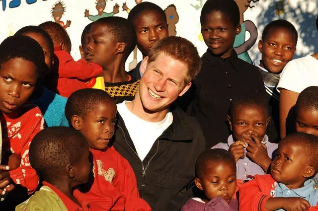 File photo dated 27/04/06 of Prince Harry (now the Duke of Sussex) meeting youngsters in the grounds of the Mants’ase children’s home, while on a return visit to Lesotho in southern Africa