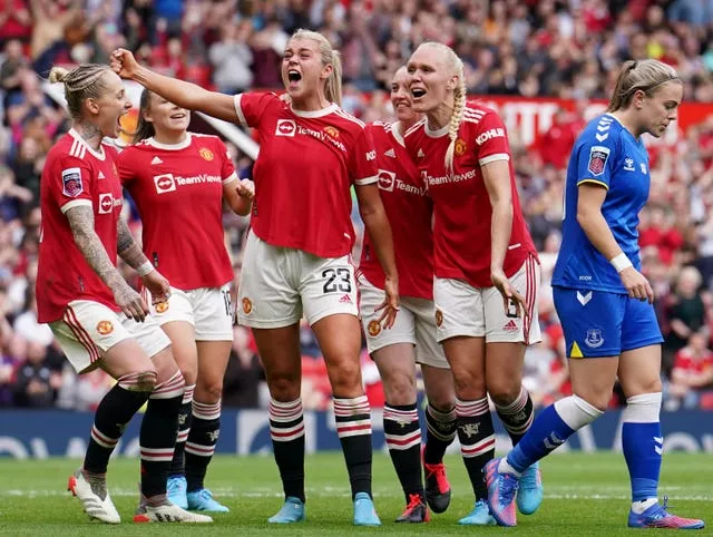 Alessia Russo and her Manchester United team-mates celebrate