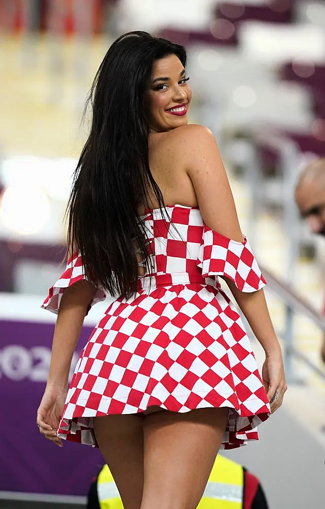 Ivana Knoll, Croatia fan and model who has been pushing the modesty dress  code of Qatar and causing a stir online is seen in the stands before the  FIFA World Cup Group