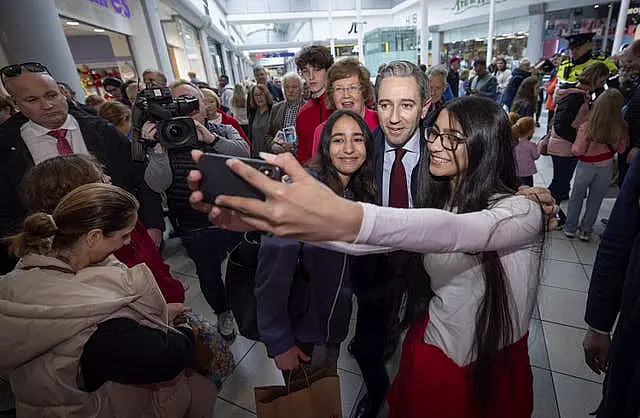 Taoiseach Simon Harris meeting the public while canvassing in Limerick, ahead of the General Election on November 29