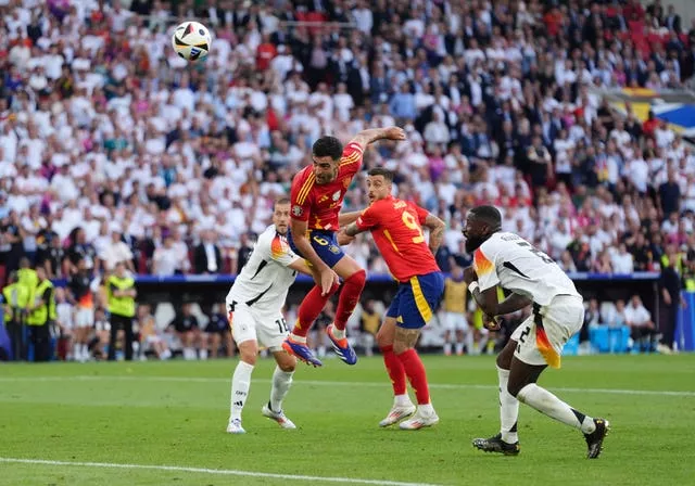 Mikel Merino heads the winner for Spain against Germany at Euro 2024