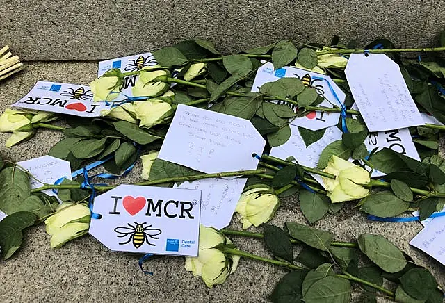 Floral tributes left in St Ann’s Square in Manchester city centre remembering those killed in the arena bombing