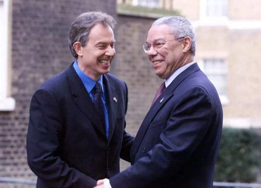 Then prime minister Tony Blair (left) greeting then US secretary of state Colin Powell (Sean Dempsey/PA)