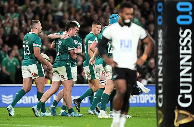 Gus McCarthy celebrates scoring Ireland's sixth try