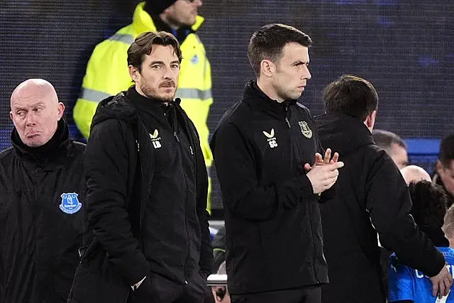 Everton caretaker managers Leighton Baines, left, and Seamus Coleman watch from the sidelines