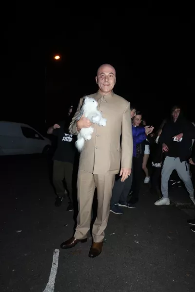 David Walliams surrounded by fans as he arrives at a Halloween party hosted by Jonathan Ross at his house in north London.