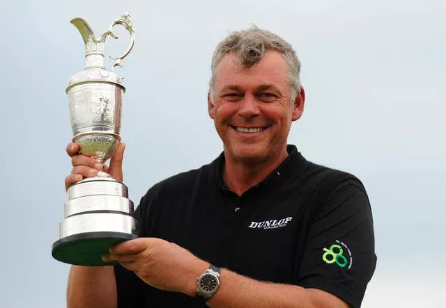 Darren Clarke holds the Claret Jug after winning the 2011 Open Championship at Royal St George’s 