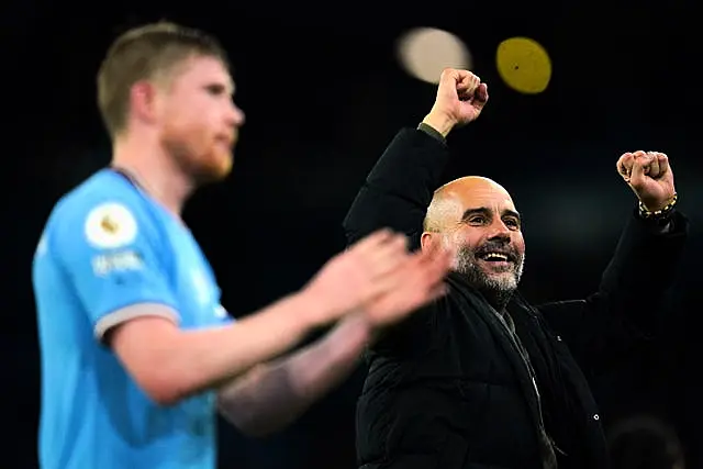 Kevon De Bruyne and Pep Guardiola celebrate a victory together