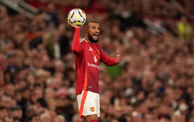 Manchester United’s Noussair Mazraoui prepares to take a throw-in