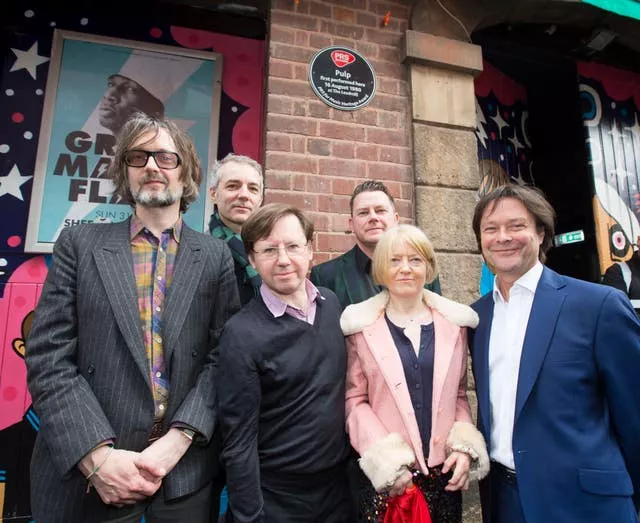 Pulp's Jarvis Cocker, Steve Mackey, Mark Webber, Nick Banks and Candida Doyle are presented with a music Heritage Award at The Leadmill in Sheffield by PRS For Music Deputy Chairman, Simon Darlow 