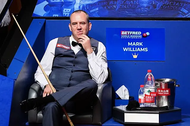 Mark Williams, pictured, trails Judd Trump by six frames (Zac Goodwin/PA)