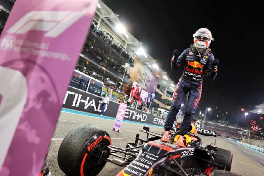 Verstappen won in Abu Dhabi after overtaking Lewis Hamilton on the final lap (PA).