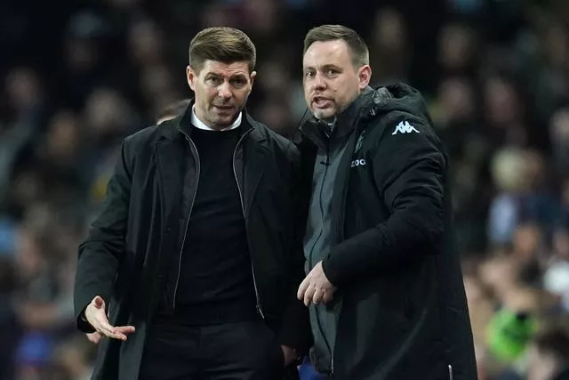 Steven Gerrard (left) and Michael Beale on the touchline