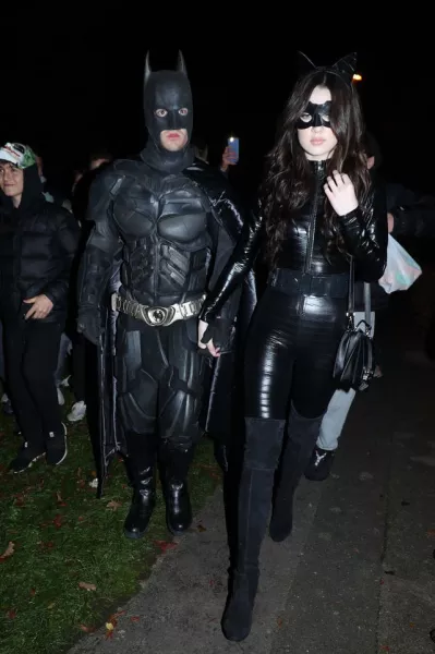 Liam Payne (left) arrives at a Halloween party hosted by Jonathan Ross at his house in north London.