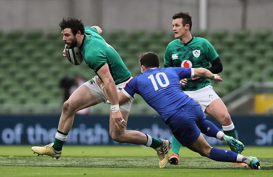 Robbie Henshaw, left, wants Ireland to have a positive approach to their remaining Six Nations fixtures