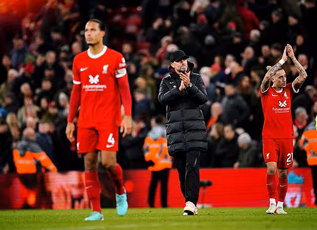 Liverpool manager Jurgen Klopp (centre) applauds the fans (Peter Byrne/PA)