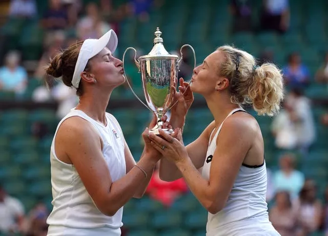 Barbora Krejcikova and Katerina Siniakova (right) celebrate victory in the Wimbledon doubles final in 2022 