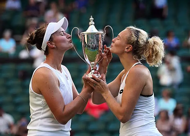 Barbora Krejcikova and Katerina Siniakova (right) celebrate victory in the Wimbledon doubles final in 2022 