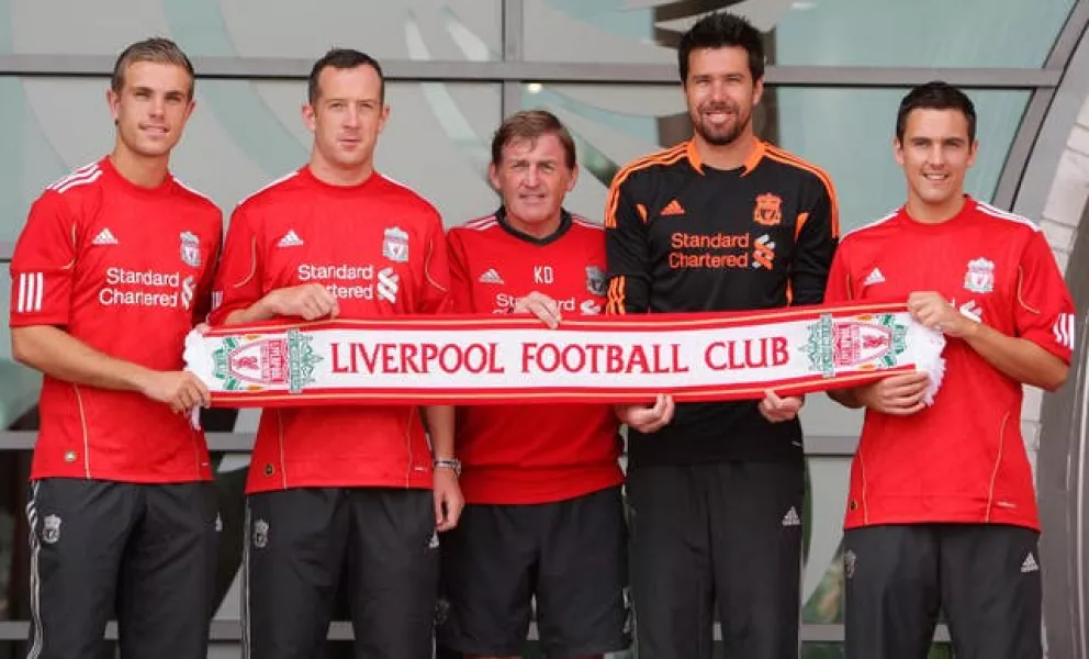 Liverpool signings (left to right) Jordan Henderson, Charlie Adam, manager Kenny Dalglish, Alexander Doni and Stewart Downing in 2011