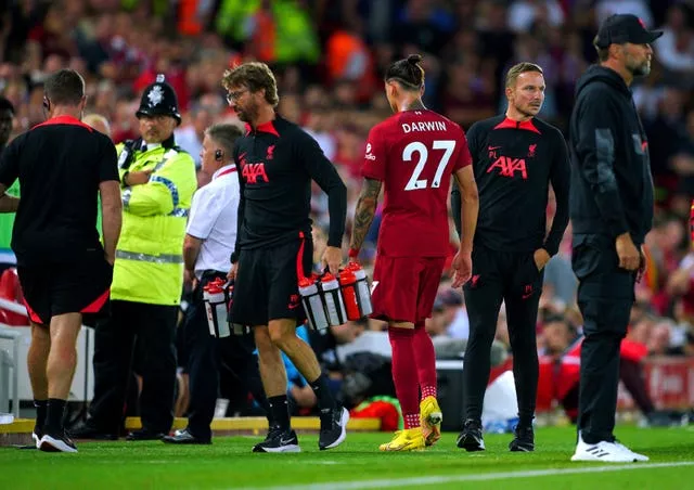 Liverpool’s Darwin Nunez (centre right) leaves the pitch after being sent off against Crystal Palace