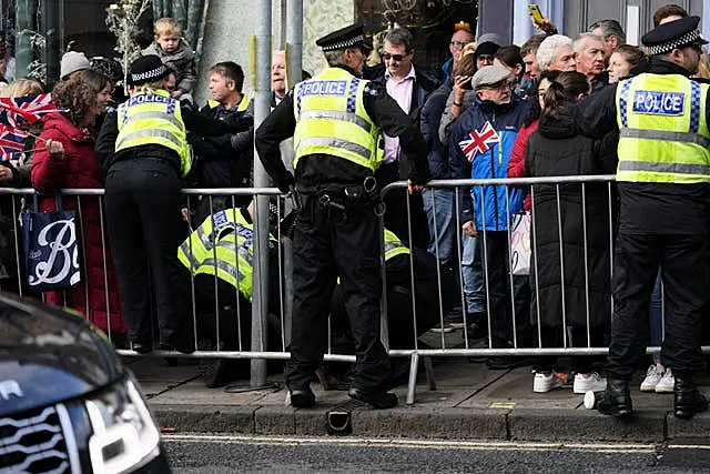 Police detain protester Patrick Thelwell (Jacob King/PA)