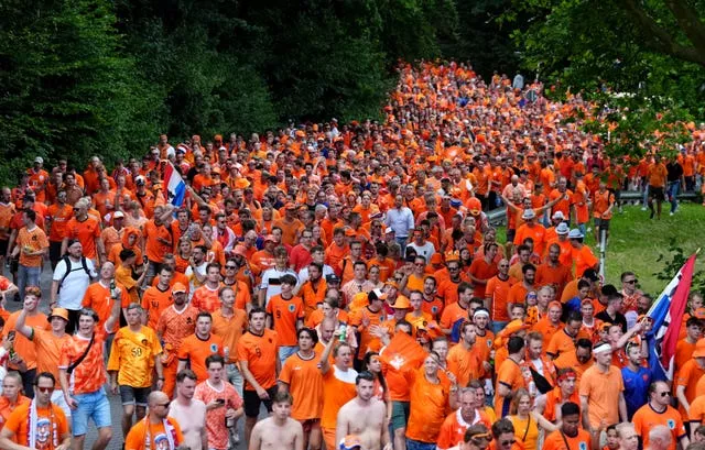 Lots of Netherlands fans walk in Dortmund