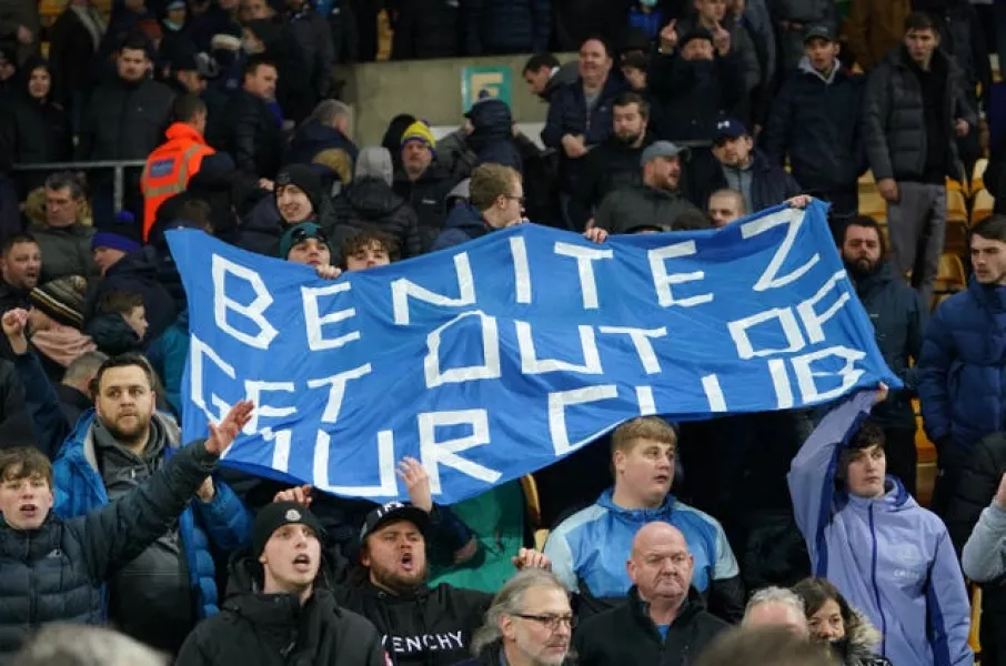 Everton fans hold a protest banner against manager Rafael Benitez
