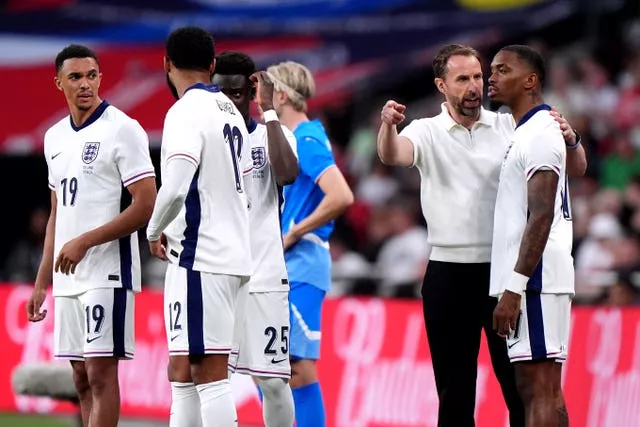 England manager Gareth Southgate speaks to Ivan Toney before he was brought on against Iceland on Friday