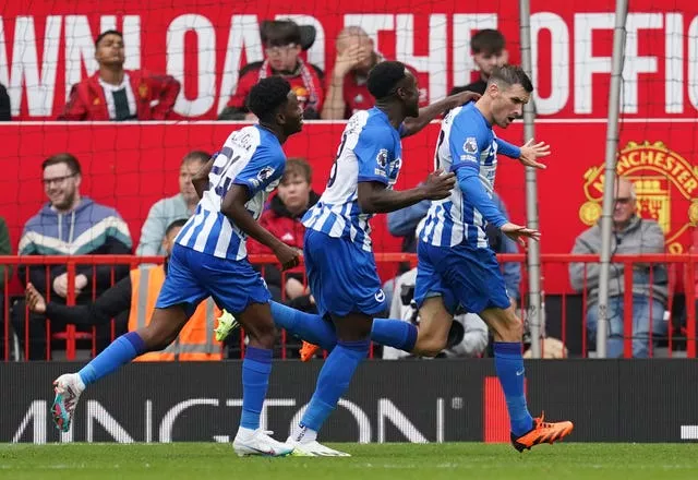 Brighton players celebrate during their 3-1 win over United 