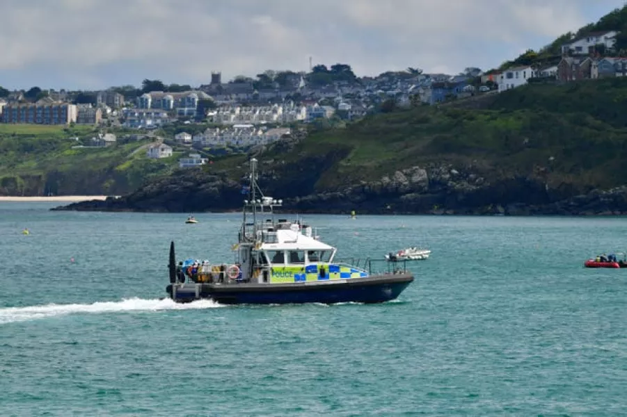 Police boats patrol St Ives bay, ahead of the G7 summit in Cornwall (Ben Birchall/PA)