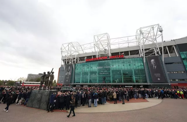 The funeral procession arrives outside Old Trafford (David Davies/PA)