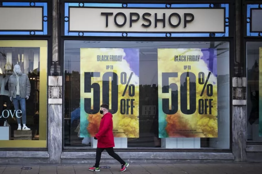 A Topshop store with sales posters