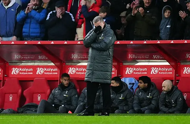 Ange Postecoglou puts his hand over his eyes on the touchline