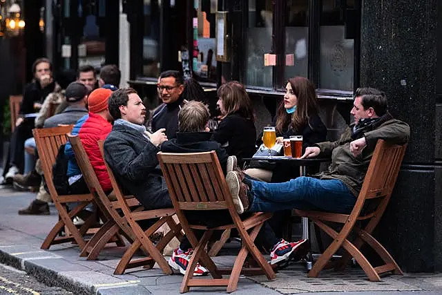 Drinkers outside a pub