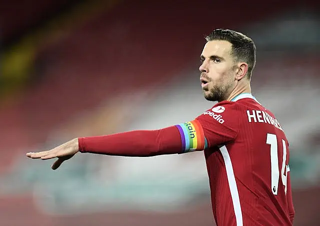 Liverpool’s Jordan Henderson wears a rainbow coloured captain’s armband 